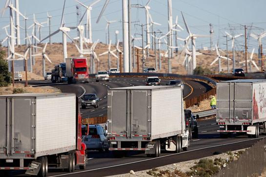 Trucks crossing the Banning Pass | David McNew/Getty© Provided by MotorBiscuit